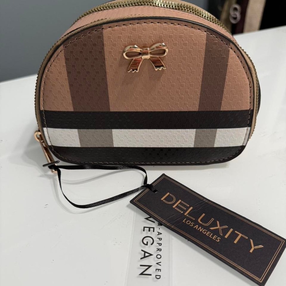 Tan and brown Deluxity Los Angeles โ bag with zipper closures